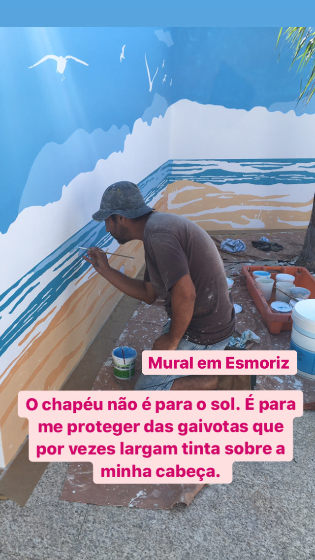 "Mural of Esmoriz. The hat is not for the sun. It's to protect me from the seagulls that sometimes drop paint on my head."